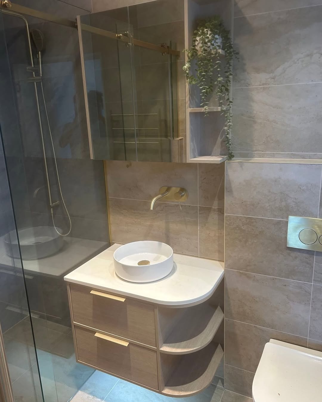 Stunning and fresh bathroom renovation combines modern design with timeless elegance. - Image 1