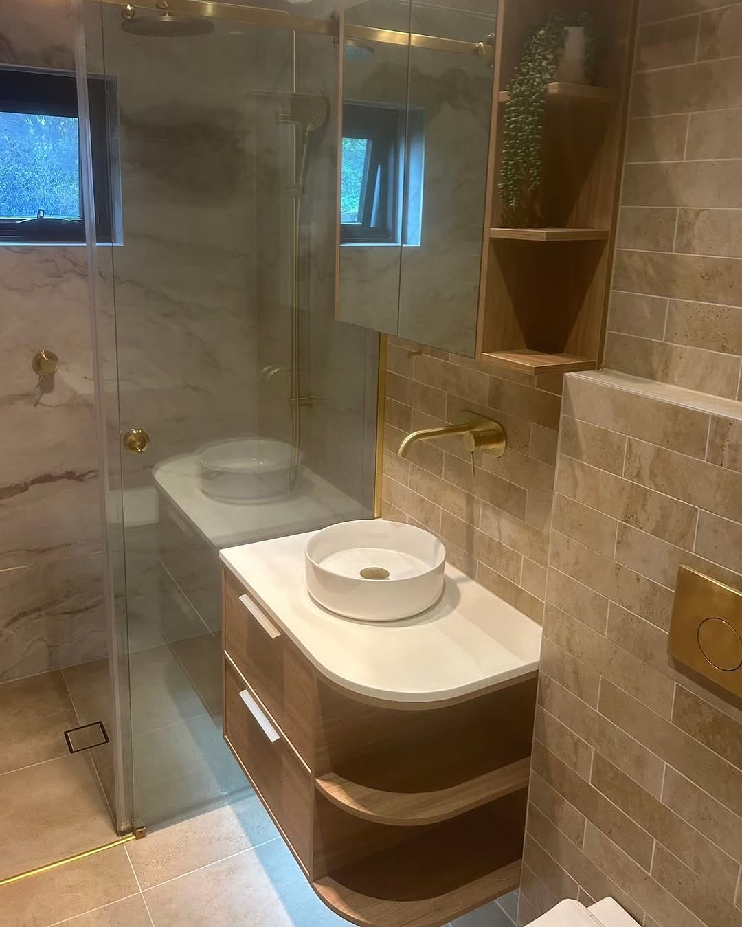 Stunning and fresh bathroom renovation combines modern design with timeless elegance. — image 2